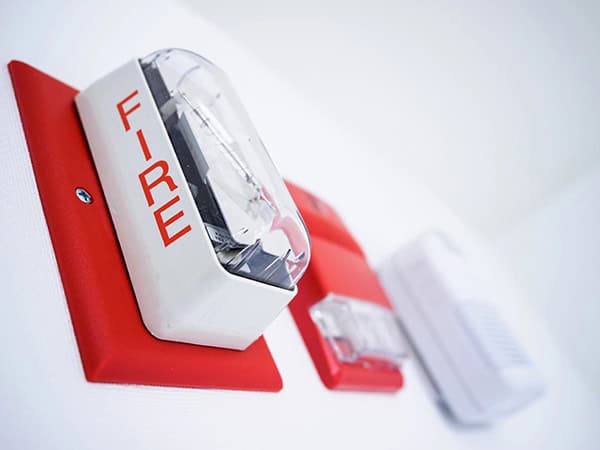 Fire Alarm on Wall | Fire Protection Contractor Liability Insurance | Risk Suppression Partners