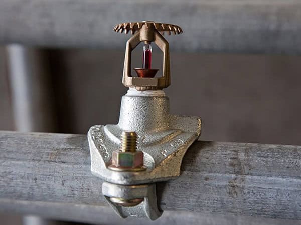 Sprinkler Head On Pipe | Fire Protection Contractor Liability Insurance | Risk Suppression Partners